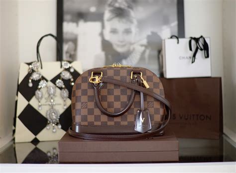 louis vuitton almba bb|louis vuitton alma bb outfits.